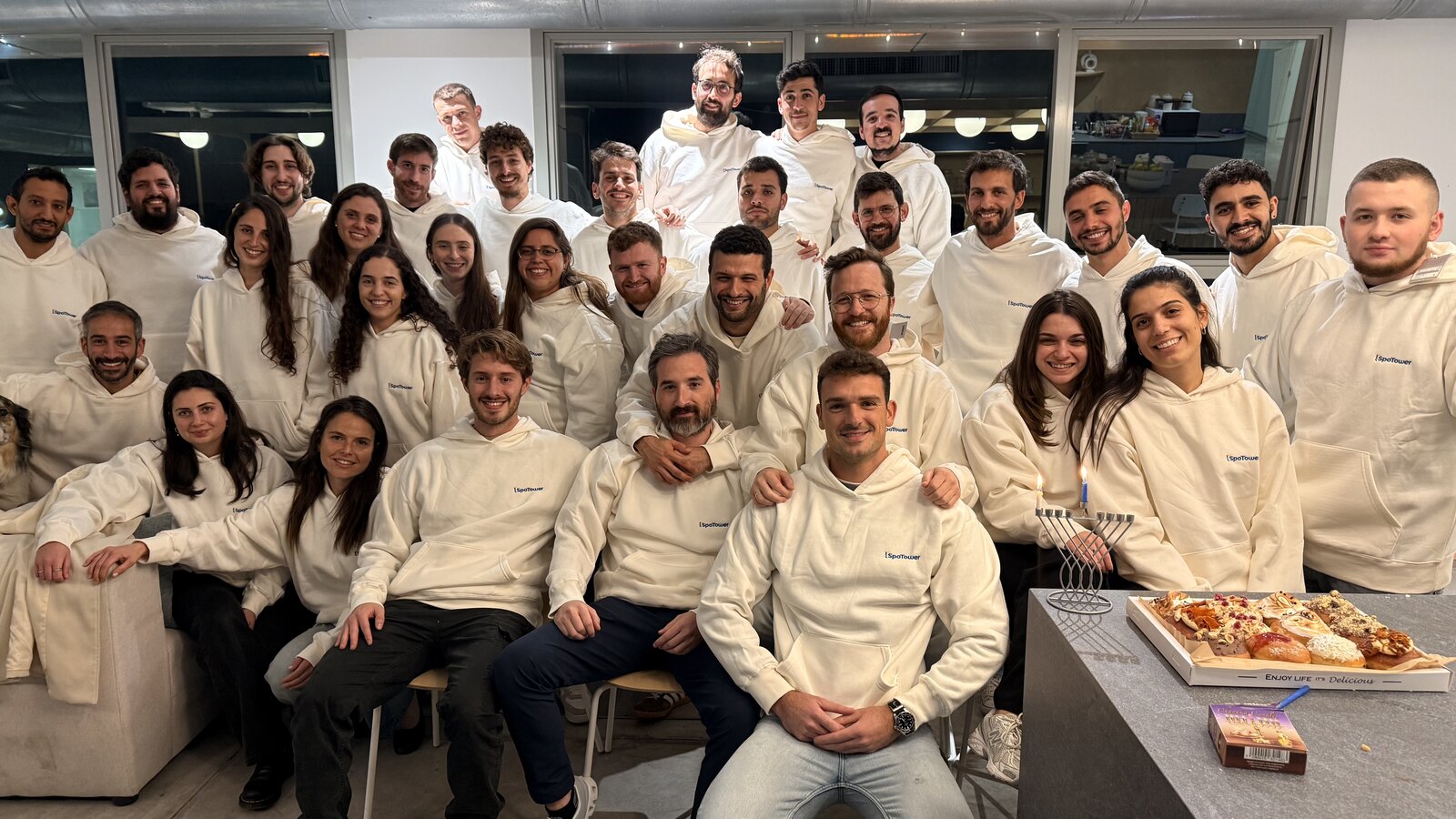 Whole SpoTower team in matching hoodies